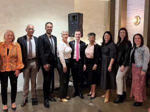 Mayor Gangemi poses alongside members of Mind Communications Foundation