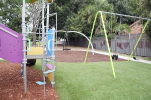 Christopher Street Reserve Playground behind the slide and swing